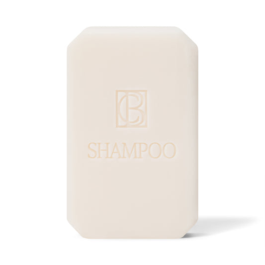 Close up of Hyaluronic+ Solid Shampoo Bar, a plastic free hair care solution, gently cleanses and softens hair.