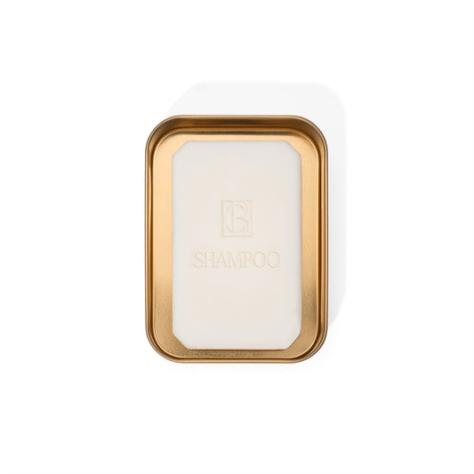 Travel Case for Shampoo & Conditioner Bars in gold tin, holding a solid shampoo bar perfect for plastic free hair care on the go.
