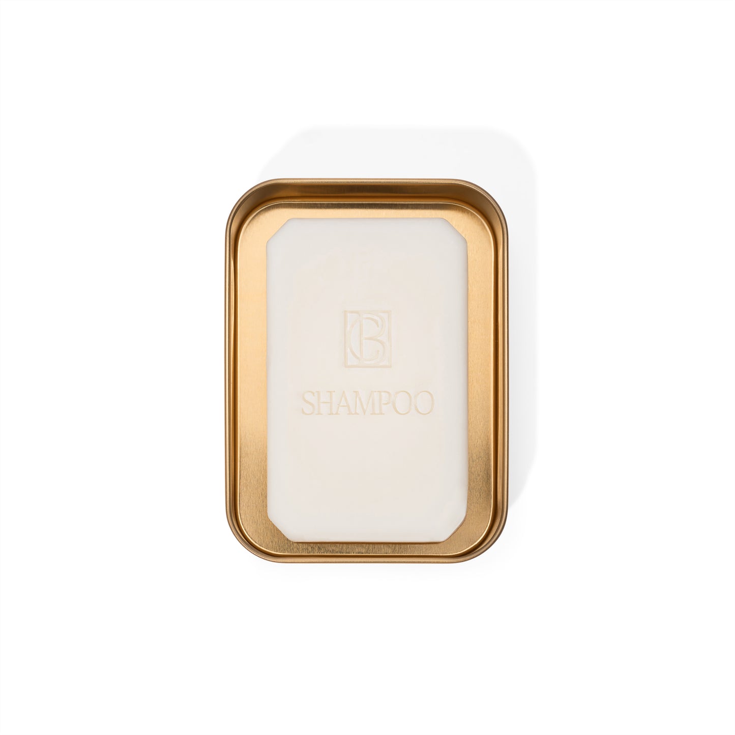 Travel Case for Shampoo & Conditioner Bars in gold tin, holding a solid shampoo bar perfect for plastic free hair care on the go.
