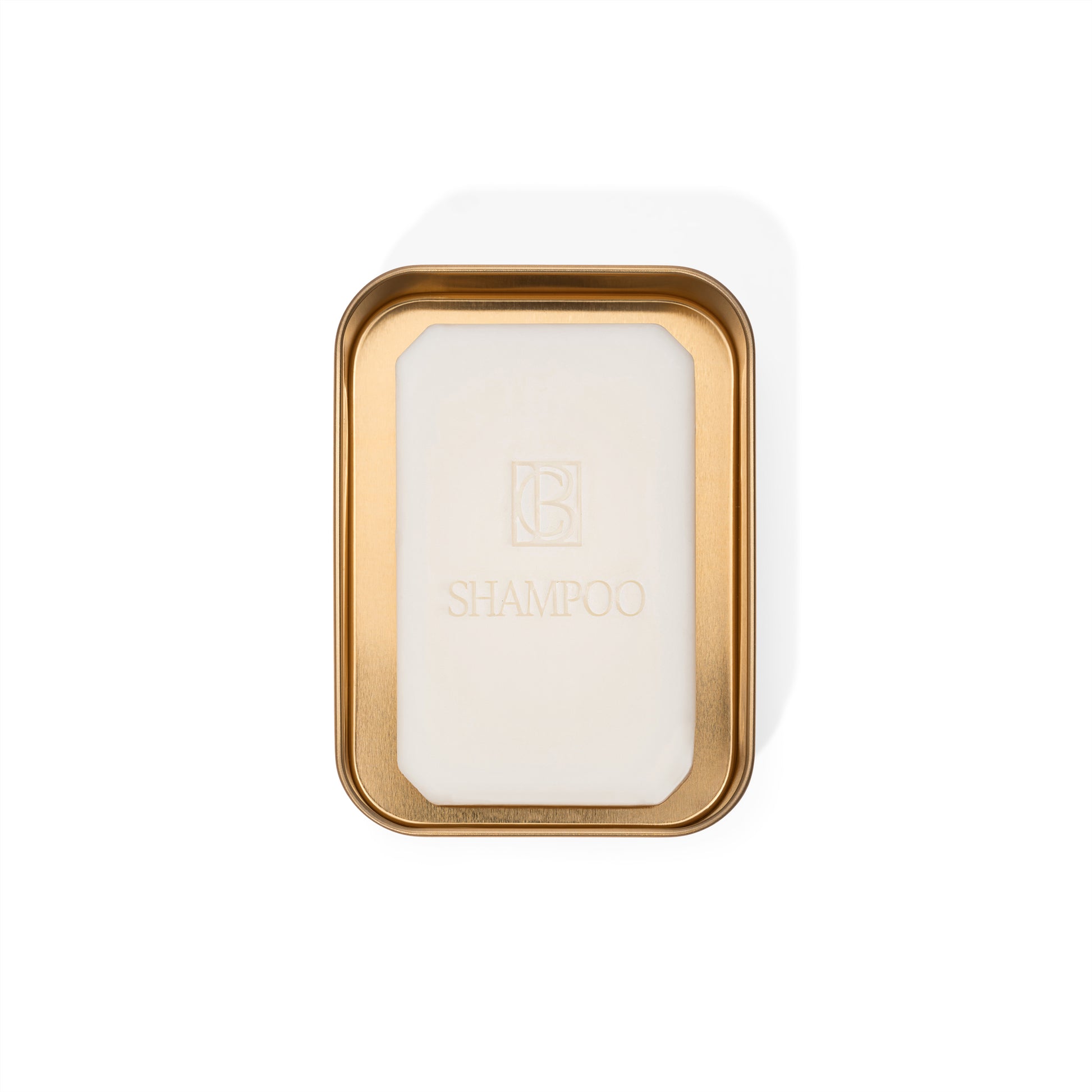 Travel Case for Shampoo & Conditioner Bars in gold tin, holding a solid shampoo bar perfect for plastic free hair care on the go.